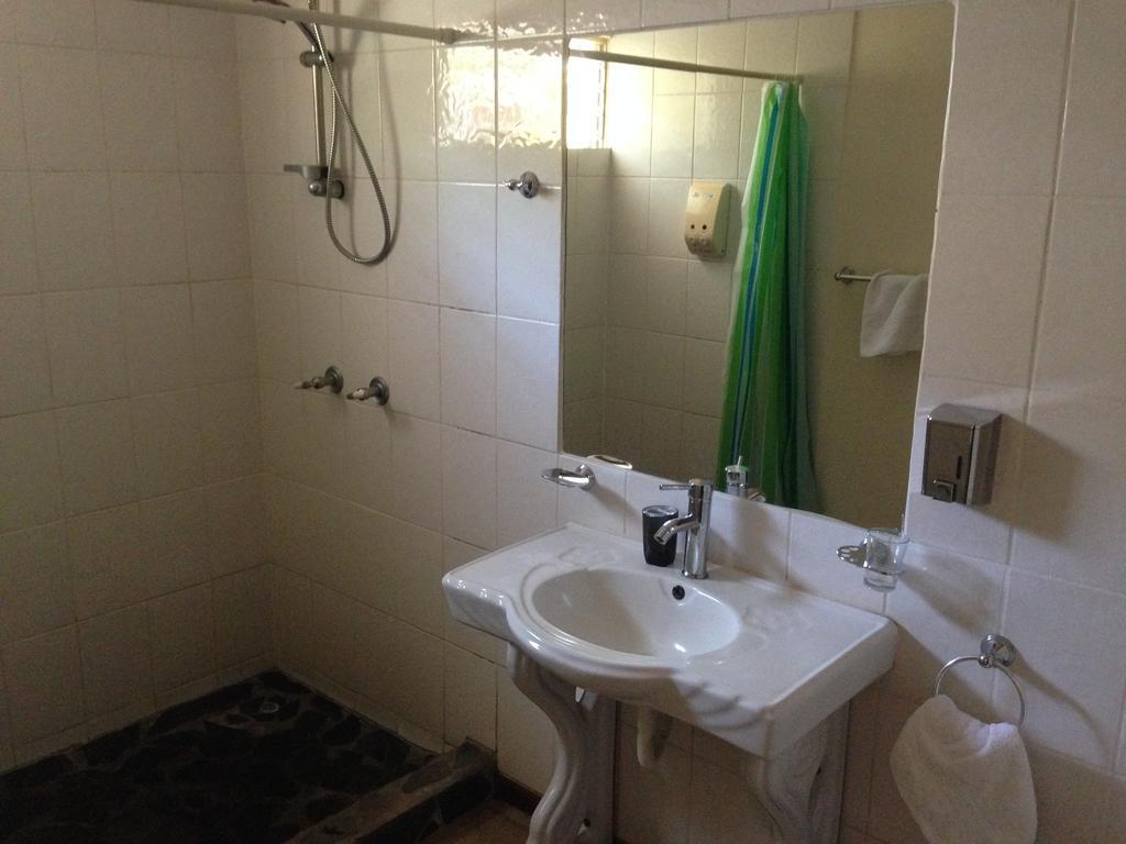 Dushi Vida Country Inn Alajuela Quarto foto